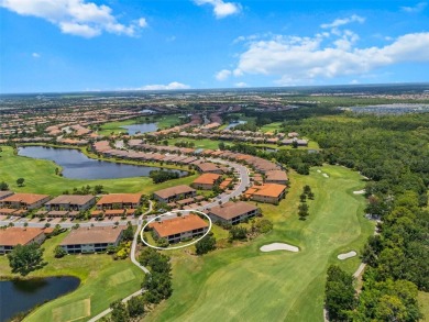 Experience refined living in this elegant second-floor residence on Esplanade Golf and Country at Lakewood Ranch in Florida - for sale on GolfHomes.com, golf home, golf lot