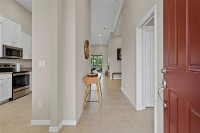 Experience refined living in this elegant second-floor residence on Esplanade Golf and Country at Lakewood Ranch in Florida - for sale on GolfHomes.com, golf home, golf lot