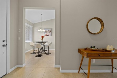 Experience refined living in this elegant second-floor residence on Esplanade Golf and Country at Lakewood Ranch in Florida - for sale on GolfHomes.com, golf home, golf lot
