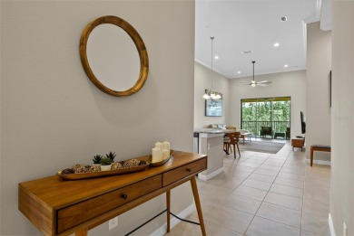 Experience refined living in this elegant second-floor residence on Esplanade Golf and Country at Lakewood Ranch in Florida - for sale on GolfHomes.com, golf home, golf lot