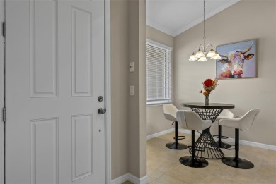 Experience refined living in this elegant second-floor residence on Esplanade Golf and Country at Lakewood Ranch in Florida - for sale on GolfHomes.com, golf home, golf lot