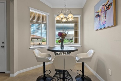 Experience refined living in this elegant second-floor residence on Esplanade Golf and Country at Lakewood Ranch in Florida - for sale on GolfHomes.com, golf home, golf lot