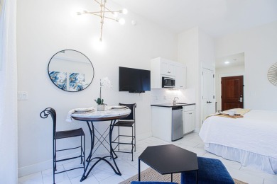 It's all about location--and this charming, beautifully updated on Sandestin Golf and Beach Resort - Raven in Florida - for sale on GolfHomes.com, golf home, golf lot