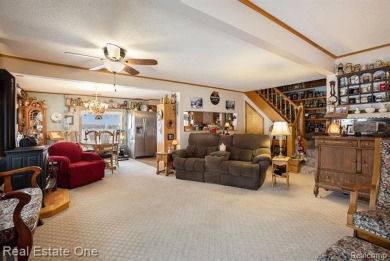An exceptional opportunity awaits you to own an incredible one+ on Gladwin Heights Golf Course in Michigan - for sale on GolfHomes.com, golf home, golf lot