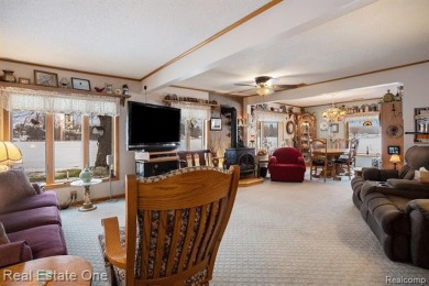 An exceptional opportunity awaits you to own an incredible one+ on Gladwin Heights Golf Course in Michigan - for sale on GolfHomes.com, golf home, golf lot
