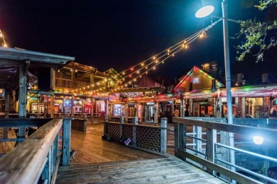 It's all about location--and this charming, beautifully updated on Sandestin Golf and Beach Resort - Raven in Florida - for sale on GolfHomes.com, golf home, golf lot