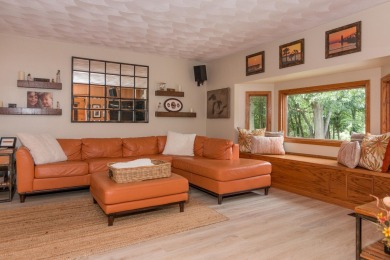 This extraordinary property boasts three spacious bedrooms, two on Pine View Golf Club in Michigan - for sale on GolfHomes.com, golf home, golf lot