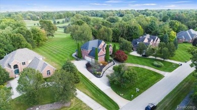 Welcome to this 3000 square foot Brick Colonial, perfectly on Paint Creek Country Club in Michigan - for sale on GolfHomes.com, golf home, golf lot