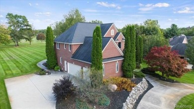 Welcome to this 3000 square foot Brick Colonial, perfectly on Paint Creek Country Club in Michigan - for sale on GolfHomes.com, golf home, golf lot