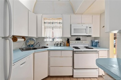 Two bedroom/1 bath 1st floor unit with parking directly out your on Monterey Yacht and Country Club in Florida - for sale on GolfHomes.com, golf home, golf lot