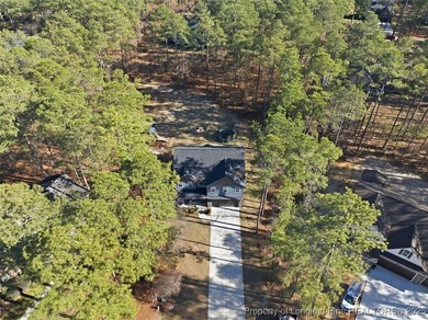 Located on a quiet cul-de-sac in the gated Deercroft community on Deercroft Golf and Country Club in North Carolina - for sale on GolfHomes.com, golf home, golf lot