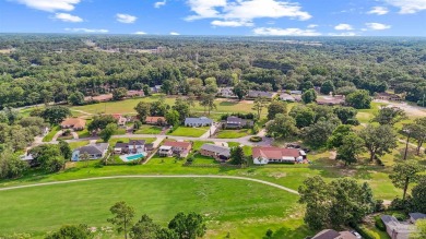 Come live the Florida lifestyle with this golf course home in on Scenic Hills Country Club in Florida - for sale on GolfHomes.com, golf home, golf lot