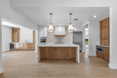 TOTALLY UPDATED, THE NEWLY COMPLETED RENOVATIONS INCLUDE: BRAND on St. Andrews Country Club of Boca Raton in Florida - for sale on GolfHomes.com, golf home, golf lot