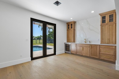 TOTALLY UPDATED, THE NEWLY COMPLETED RENOVATIONS INCLUDE: BRAND on St. Andrews Country Club of Boca Raton in Florida - for sale on GolfHomes.com, golf home, golf lot