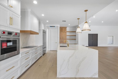 TOTALLY UPDATED, THE NEWLY COMPLETED RENOVATIONS INCLUDE: BRAND on St. Andrews Country Club of Boca Raton in Florida - for sale on GolfHomes.com, golf home, golf lot