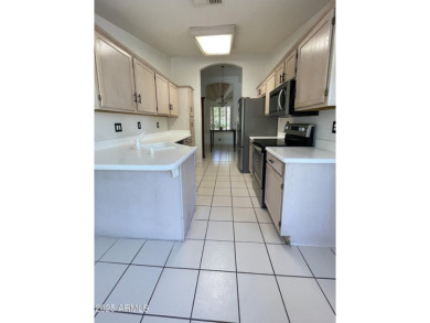 Welcome to this Key Largo model with vaulted ceilings in on Westbrook Village Golf Club in Arizona - for sale on GolfHomes.com, golf home, golf lot