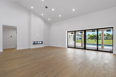 TOTALLY UPDATED, THE NEWLY COMPLETED RENOVATIONS INCLUDE: BRAND on St. Andrews Country Club of Boca Raton in Florida - for sale on GolfHomes.com, golf home, golf lot