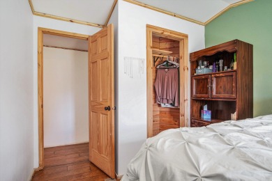Welcome to 13660 18 Mile Rd., Gowen - a peaceful country retreat on The Links of Bowen Lake in Michigan - for sale on GolfHomes.com, golf home, golf lot