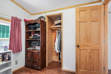 Welcome to 13660 18 Mile Rd., Gowen - a peaceful country retreat on The Links of Bowen Lake in Michigan - for sale on GolfHomes.com, golf home, golf lot