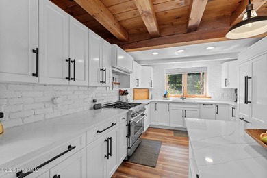 Welcome to your lakefront oasis on beautiful Lake Sequoia in the on Seven Lakes Country Club in North Carolina - for sale on GolfHomes.com, golf home, golf lot