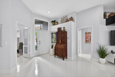 STUNNING NEWLY RE-IMAGINED POOL HOME NESTLED ON PREMIER GOLF on Ibis Golf and Country Club in Florida - for sale on GolfHomes.com, golf home, golf lot