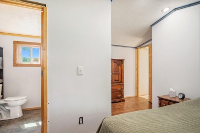 Welcome to 13660 18 Mile Rd., Gowen - a peaceful country retreat on The Links of Bowen Lake in Michigan - for sale on GolfHomes.com, golf home, golf lot