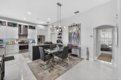 STUNNING NEWLY RE-IMAGINED POOL HOME NESTLED ON PREMIER GOLF on Ibis Golf and Country Club in Florida - for sale on GolfHomes.com, golf home, golf lot