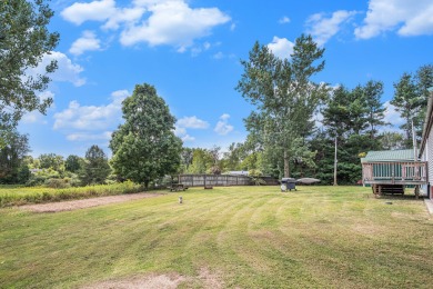 Welcome to 13660 18 Mile Rd., Gowen - a peaceful country retreat on The Links of Bowen Lake in Michigan - for sale on GolfHomes.com, golf home, golf lot