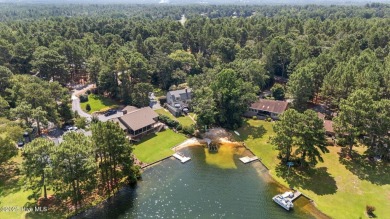 Welcome to your lakefront oasis on beautiful Lake Sequoia in the on Seven Lakes Country Club in North Carolina - for sale on GolfHomes.com, golf home, golf lot