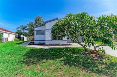 Discover the perfect blend of comfort, style, and convenience in on Palm Aire Country Club of Sarasota in Florida - for sale on GolfHomes.com, golf home, golf lot
