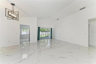Discover the perfect blend of comfort, style, and convenience in on Palm Aire Country Club of Sarasota in Florida - for sale on GolfHomes.com, golf home, golf lot