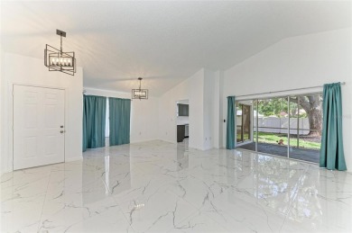 Discover the perfect blend of comfort, style, and convenience in on Palm Aire Country Club of Sarasota in Florida - for sale on GolfHomes.com, golf home, golf lot