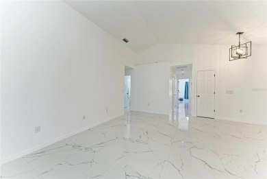 Discover the perfect blend of comfort, style, and convenience in on Palm Aire Country Club of Sarasota in Florida - for sale on GolfHomes.com, golf home, golf lot