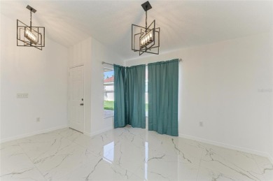 Discover the perfect blend of comfort, style, and convenience in on Palm Aire Country Club of Sarasota in Florida - for sale on GolfHomes.com, golf home, golf lot