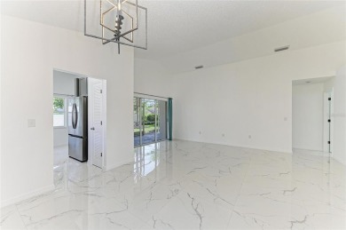 Discover the perfect blend of comfort, style, and convenience in on Palm Aire Country Club of Sarasota in Florida - for sale on GolfHomes.com, golf home, golf lot