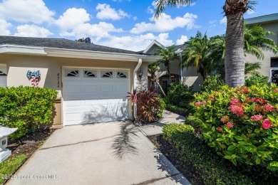 Enjoy stunning water views and abundant natural light in this on Viera East Golf Club in Florida - for sale on GolfHomes.com, golf home, golf lot