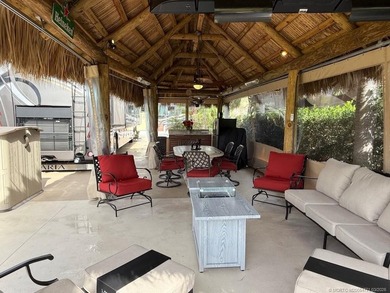 Welcome to paradise, where stunning views and comfort come on St. Lucie Trail Golf Club in Florida - for sale on GolfHomes.com, golf home, golf lot