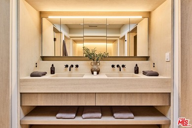 Tucked behind the guarded gates of the exclusive Malibu Colony on Calabasas Golf and Country Club in California - for sale on GolfHomes.com, golf home, golf lot