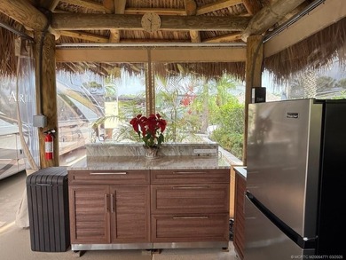 Welcome to paradise, where stunning views and comfort come on St. Lucie Trail Golf Club in Florida - for sale on GolfHomes.com, golf home, golf lot