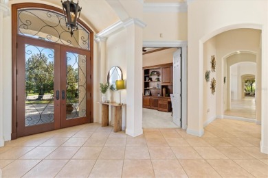 This meticulously maintained, custom-built Dan Najjar Sterling on University Park Country Club in Florida - for sale on GolfHomes.com, golf home, golf lot