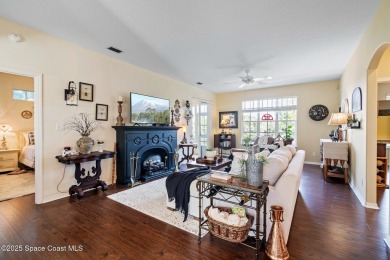 Enjoy stunning water views and abundant natural light in this on Viera East Golf Club in Florida - for sale on GolfHomes.com, golf home, golf lot