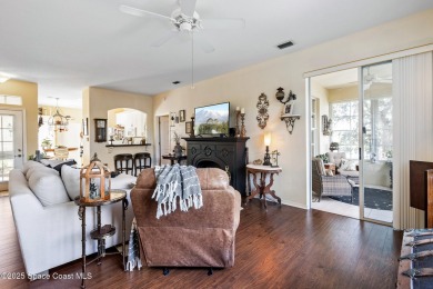 Enjoy stunning water views and abundant natural light in this on Viera East Golf Club in Florida - for sale on GolfHomes.com, golf home, golf lot