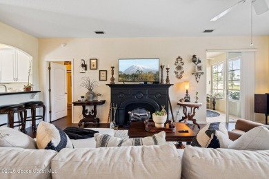 Enjoy stunning water views and abundant natural light in this on Viera East Golf Club in Florida - for sale on GolfHomes.com, golf home, golf lot