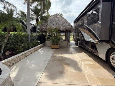 Welcome to paradise, where stunning views and comfort come on St. Lucie Trail Golf Club in Florida - for sale on GolfHomes.com, golf home, golf lot