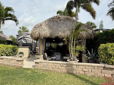 Welcome to paradise, where stunning views and comfort come on St. Lucie Trail Golf Club in Florida - for sale on GolfHomes.com, golf home, golf lot