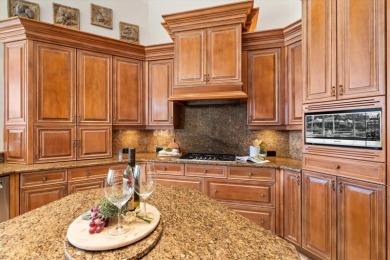 This meticulously maintained, custom-built Dan Najjar Sterling on University Park Country Club in Florida - for sale on GolfHomes.com, golf home, golf lot