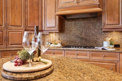 This meticulously maintained, custom-built Dan Najjar Sterling on University Park Country Club in Florida - for sale on GolfHomes.com, golf home, golf lot
