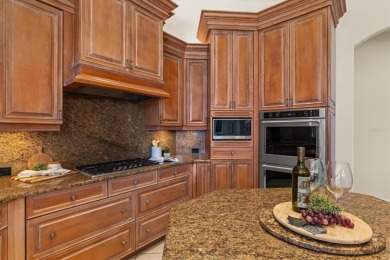 This meticulously maintained, custom-built Dan Najjar Sterling on University Park Country Club in Florida - for sale on GolfHomes.com, golf home, golf lot