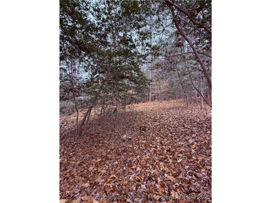 Wooded lot, perfect for building in a quiet cul de sac on Carolina Trace Country Club in North Carolina - for sale on GolfHomes.com, golf home, golf lot