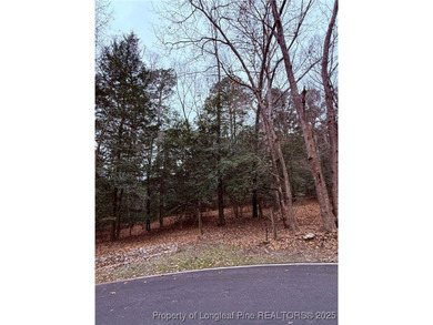 Wooded lot, perfect for building in a quiet cul de sac on Carolina Trace Country Club in North Carolina - for sale on GolfHomes.com, golf home, golf lot